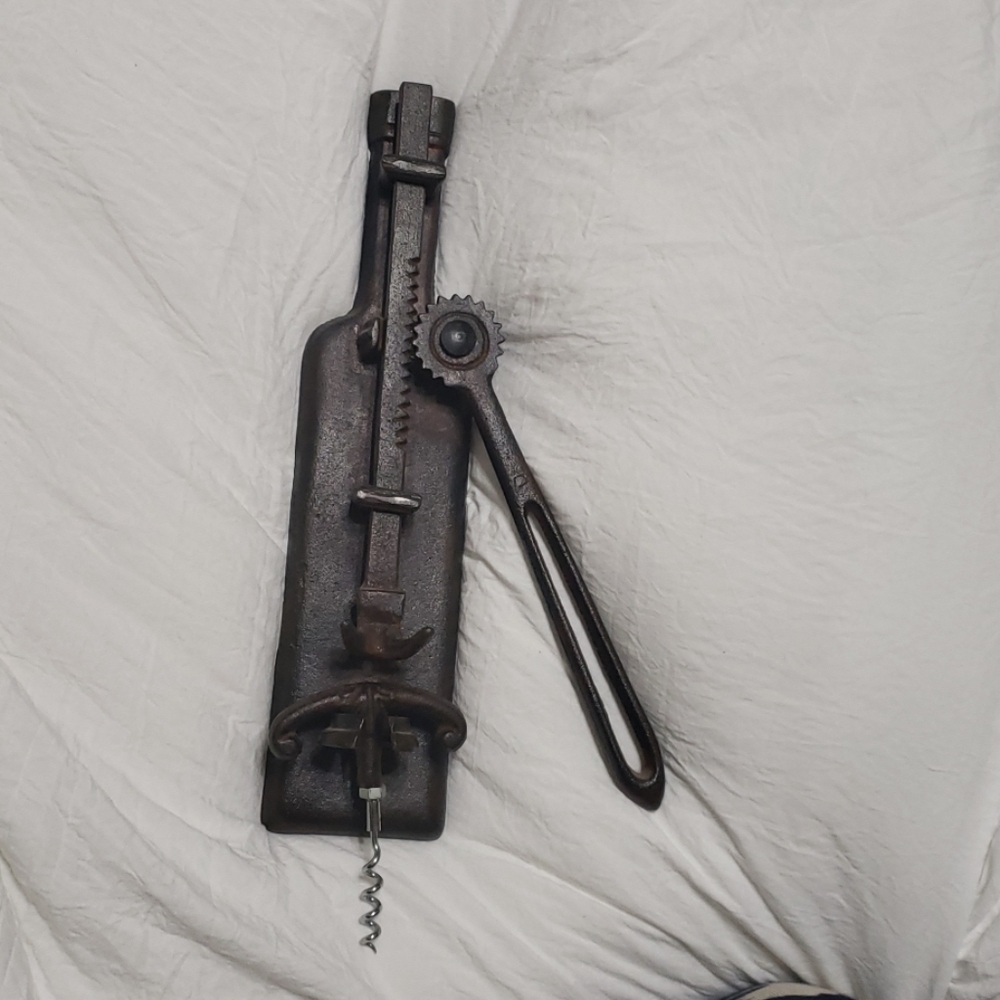 Cast iron wall mount wine bottle opener